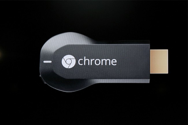 The new Google Chromecast dongle is pictured on an electronic screen as it is announced during a Google event at Dogpatch Studio in San Francisco